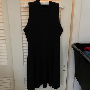 Sleeveless black dress with back cut out